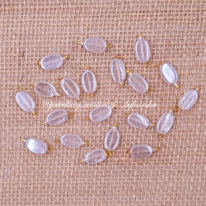 12 x 7MM Flat Oval Hanging Beads (Transparent White)