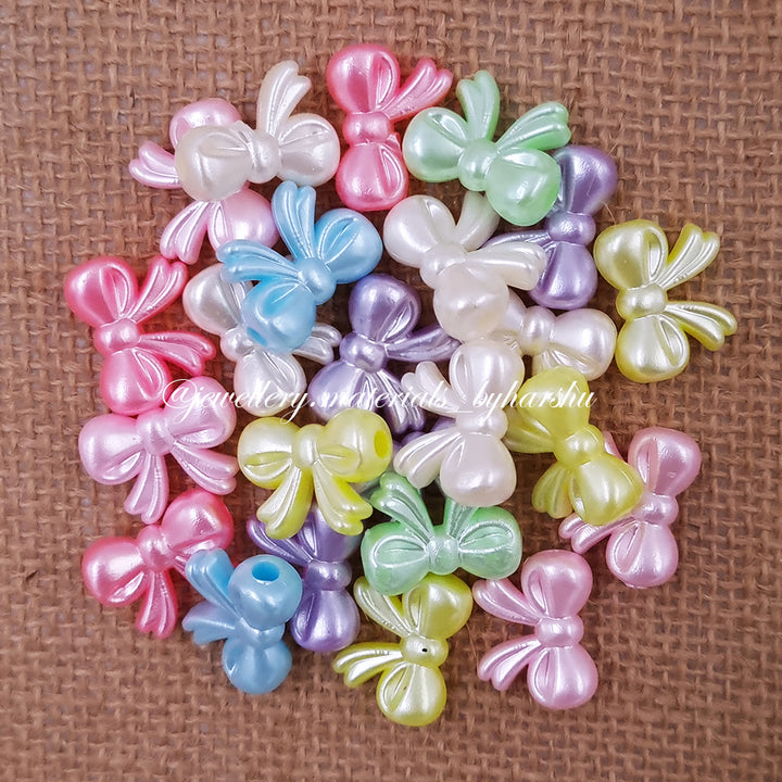 17 x 12MM Bow Pastel Beads